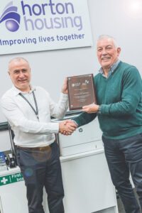 MHA chief executive, Lee Bloomfield presenting a HDN award