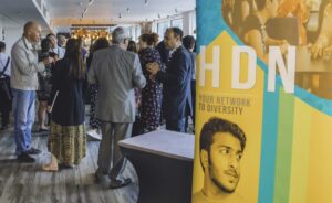 HDN Banner and a roomn full of people at out Board Diversity Conference(2024)
