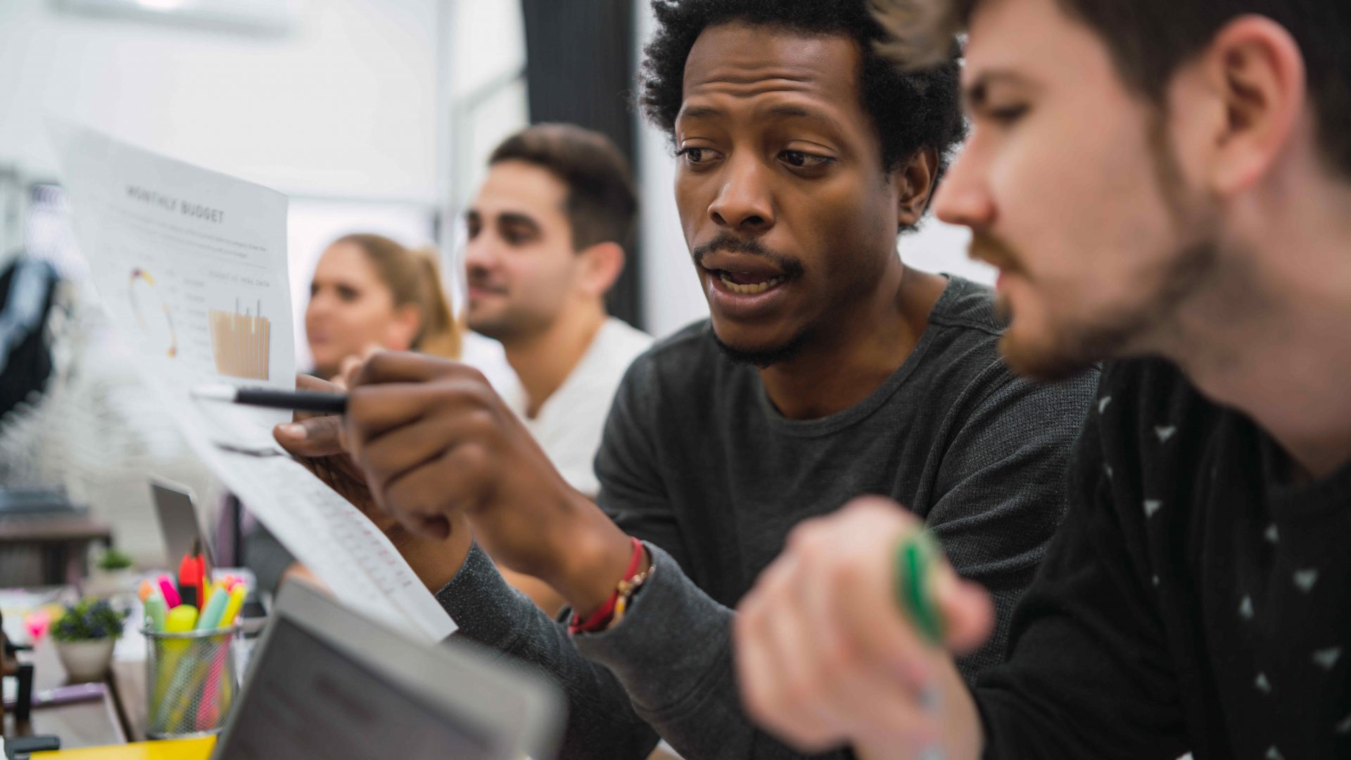 two-creative-designers-working-project-together-sharing-new-ideas-workplace-business-team-work-concept(1)